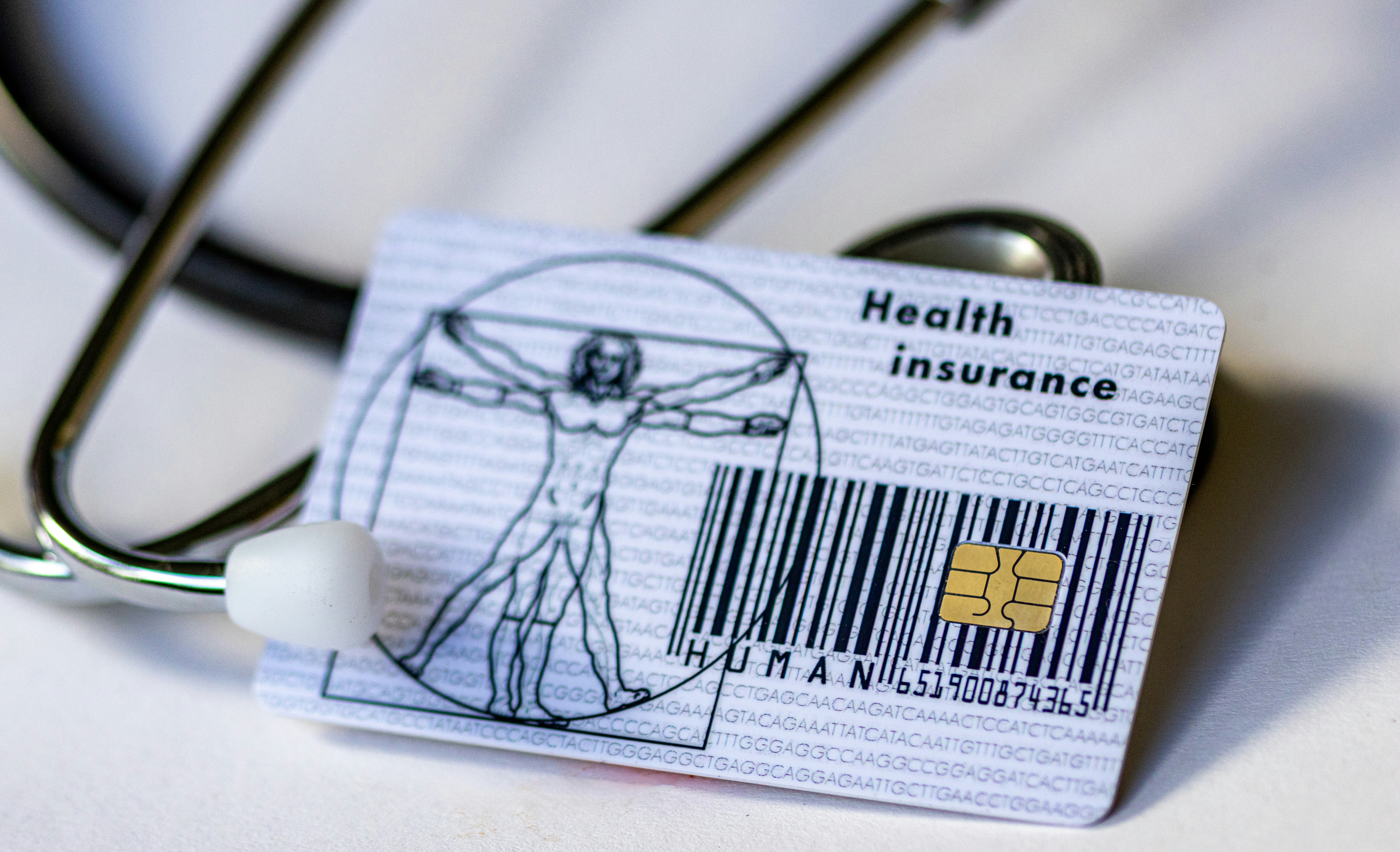 Health insurance card with stethoscope representing PolicyPilot