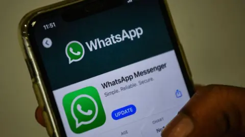 Phone showing the WhatsApp app listing